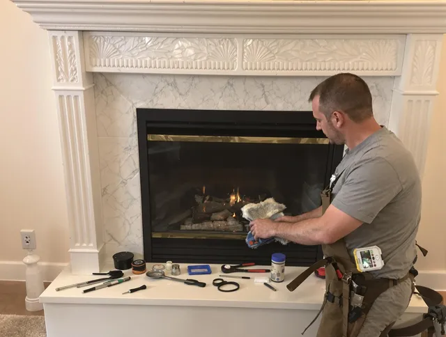 Davie Chimney Sweep performing fireplace maintenance in Davie, FL
