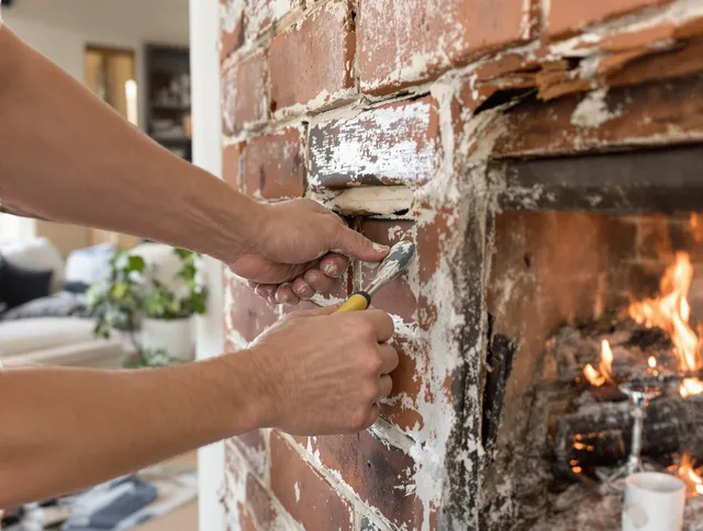 Routine fireplace repair by Davie Chimney Sweep in Davie, FL